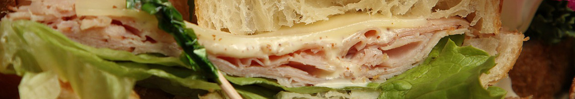 Eating Sandwich Cafe at café SoL restaurant in Niantic, CT.